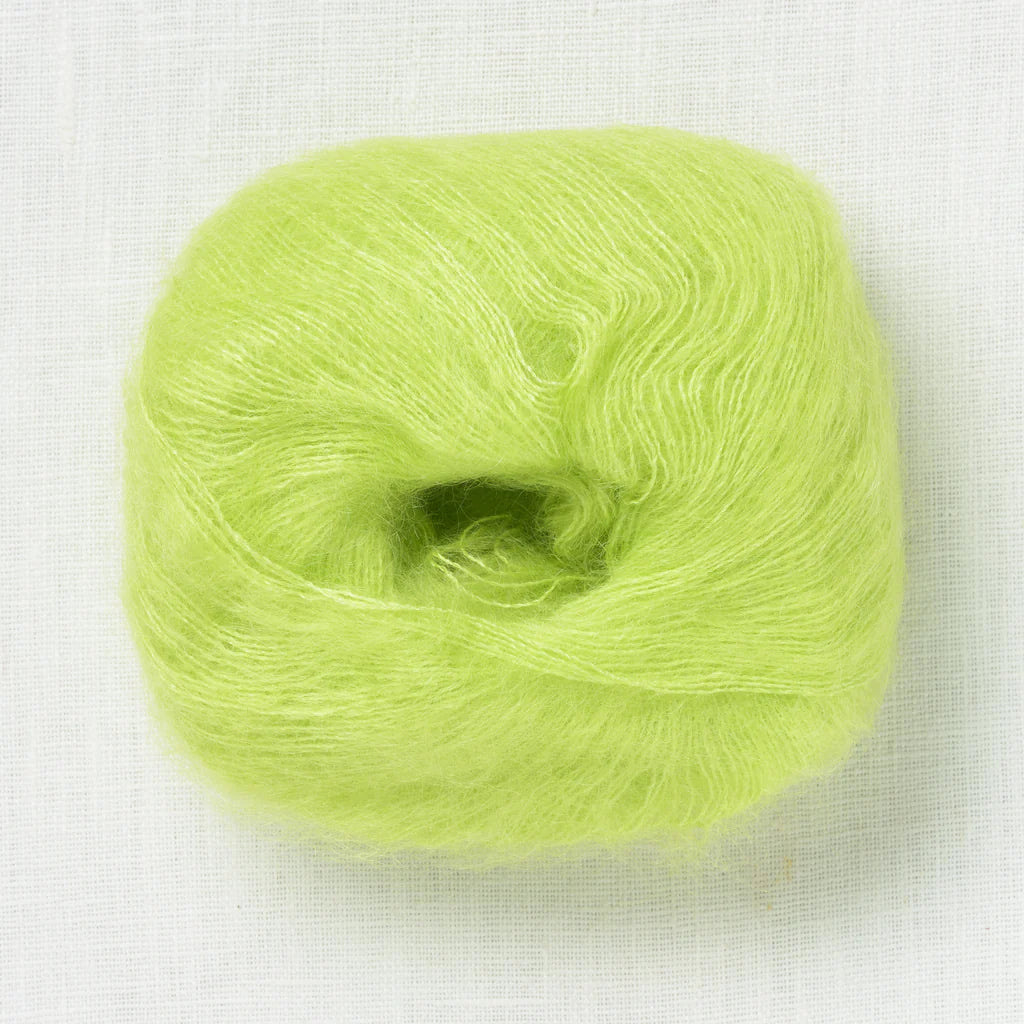 A fluffy ball of electric lime green yarn.
