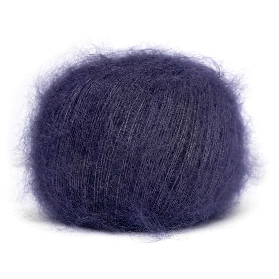A ball of fluffy grape purple yarn.