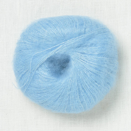 A fluffy ball of light electric blue yarn.