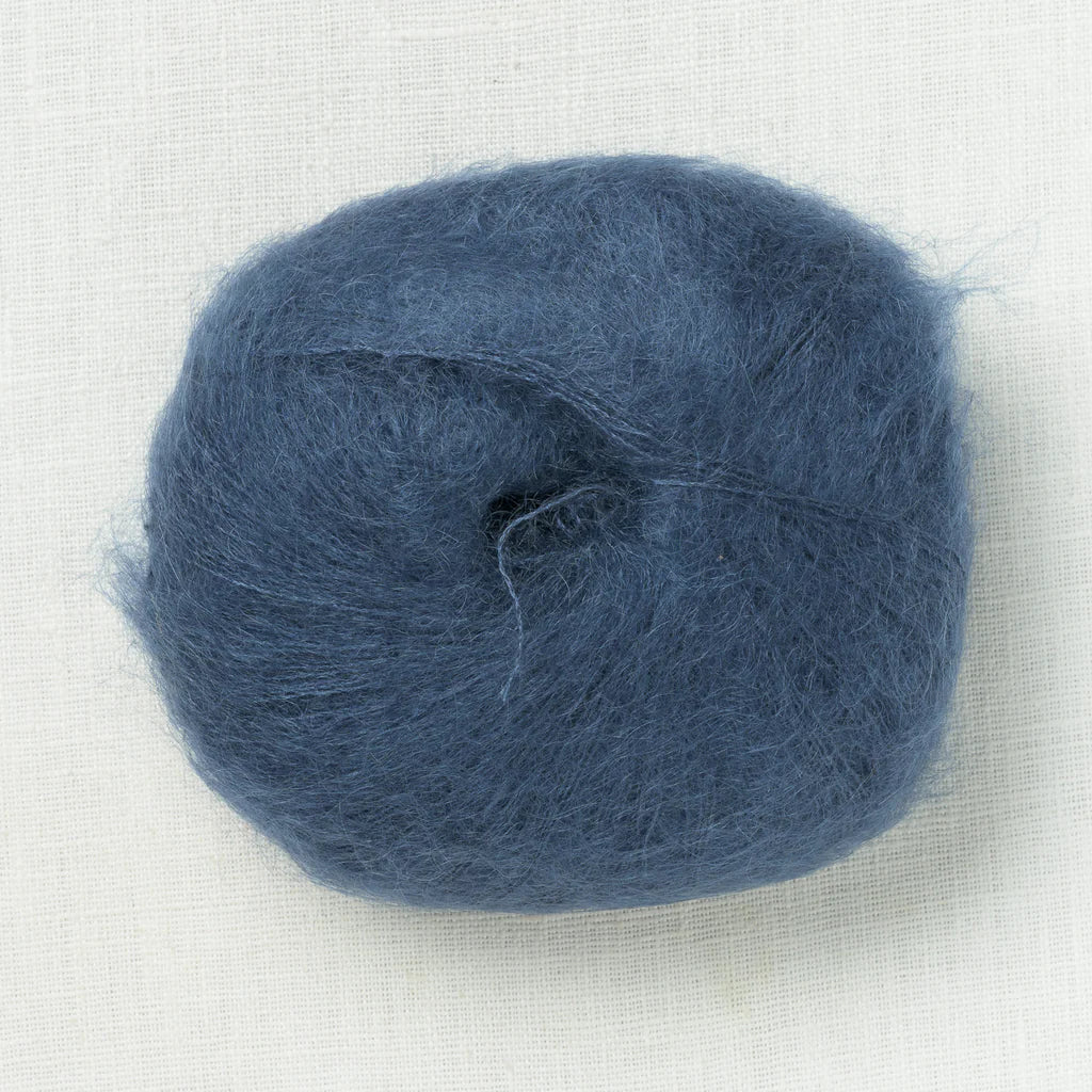 A fluffy ball of deep sea blue. 