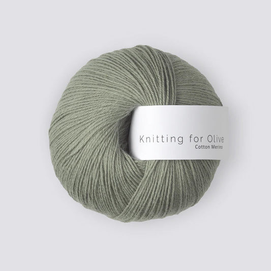 A ball of sage green yarn. 